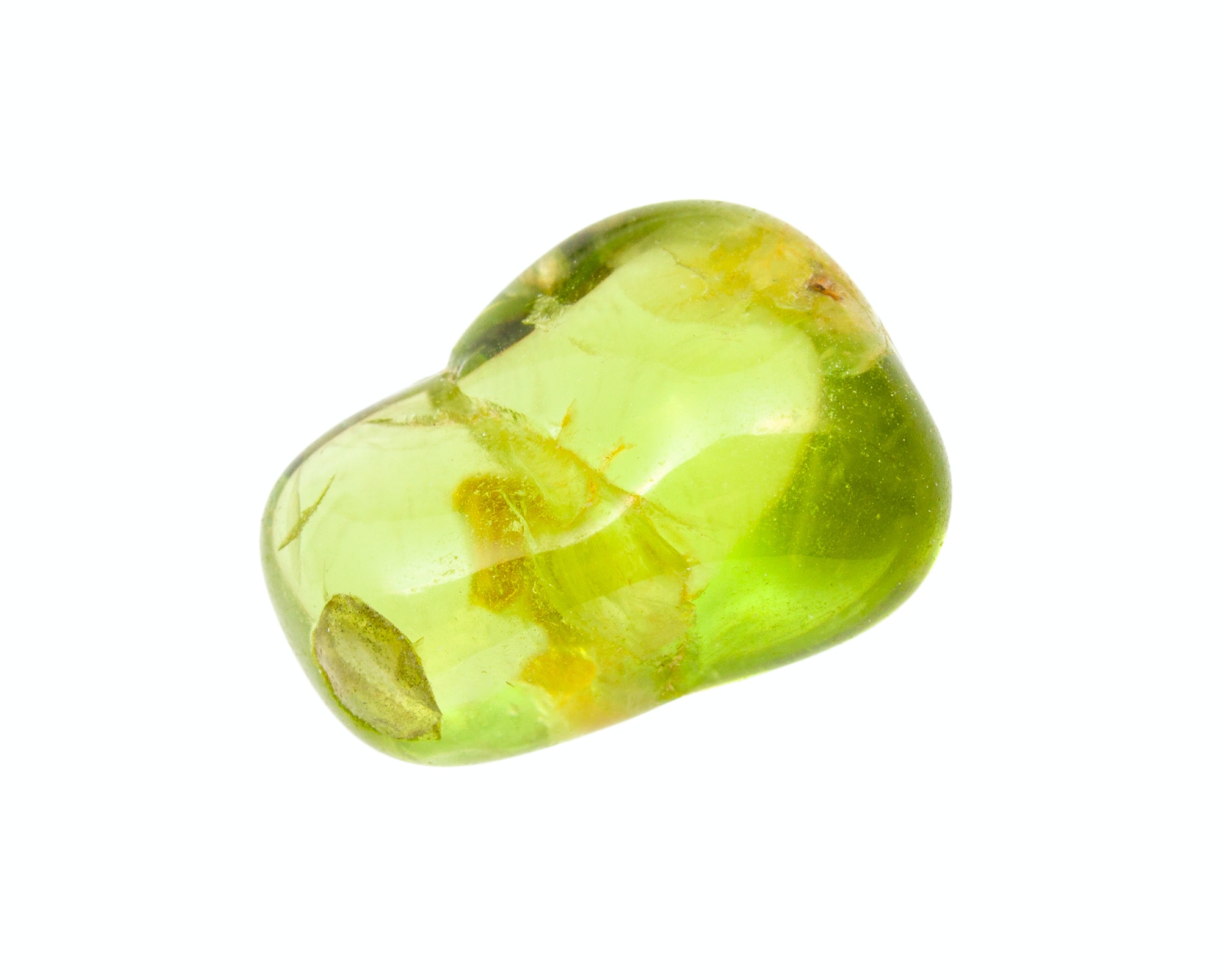 Peridot (Olivine, chrysolite) gem stone isolated